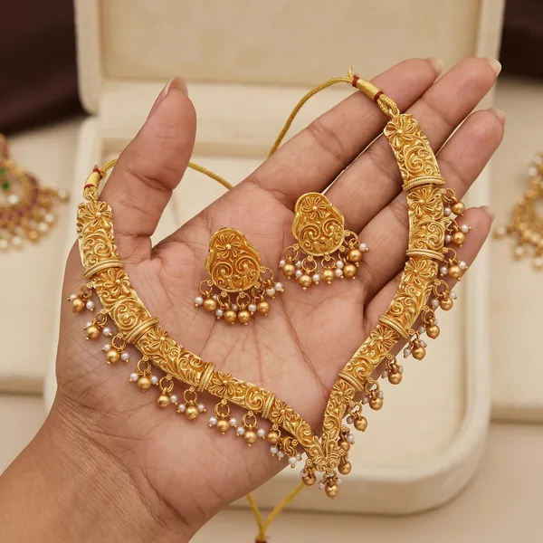 Gold_Alloy_Floral_Paisley_Pearl_Drop_Necklace_Set_With_Earrings