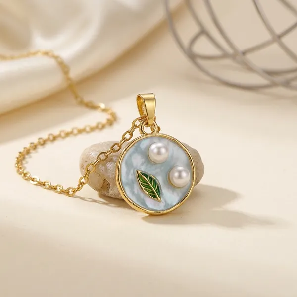 Gold_Alloy_Mother_Of_Pearl_Circular_Pendant_Necklace_For_Women
