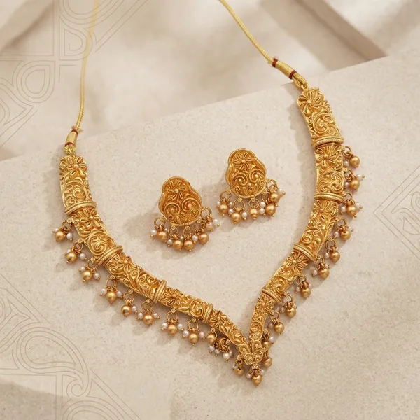 Gold_Alloy_Floral_Paisley_Pearl_Drop_Necklace_Set_With_Earrings