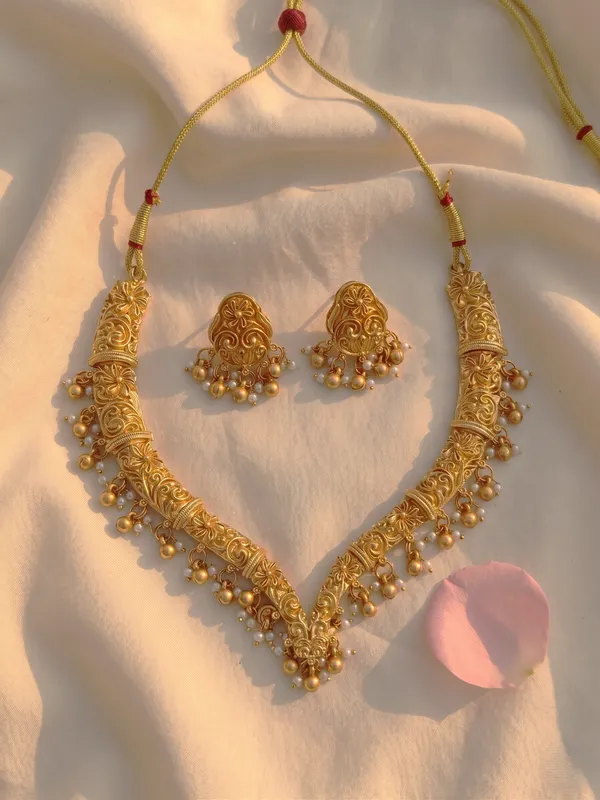 Gold_Alloy_Floral_Paisley_Pearl_Drop_Necklace_Set_With_Earrings