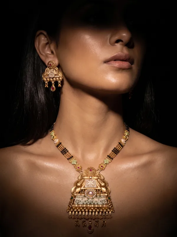 Gold_Plated_Alloy_Temple_Design_Mangalsutra_Set_With_Earrings