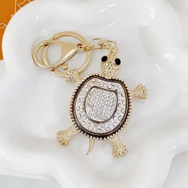 DIOXIT_Tortoise_Crystal_Keychain_For_Bike/Car_Gifting_With_Key_Ring_Anti-Rust_Key_Chain_Key_Chain_()