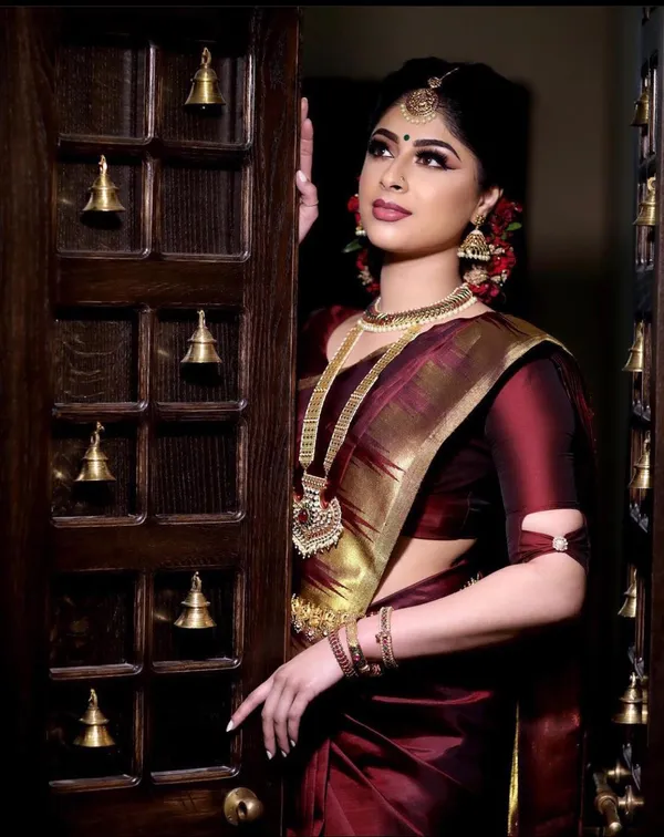 Maroon_Soft_Silk_Saree_With_Unstitched_Blouse_For_Women