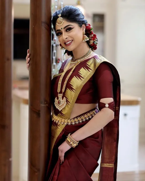 Maroon_Soft_Silk_Saree_With_Unstitched_Blouse_For_Women