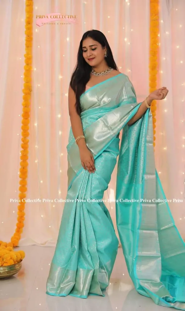 Sky_Blue_Soft_Silk_Saree_With_Unstitched_Blouse_For_Women