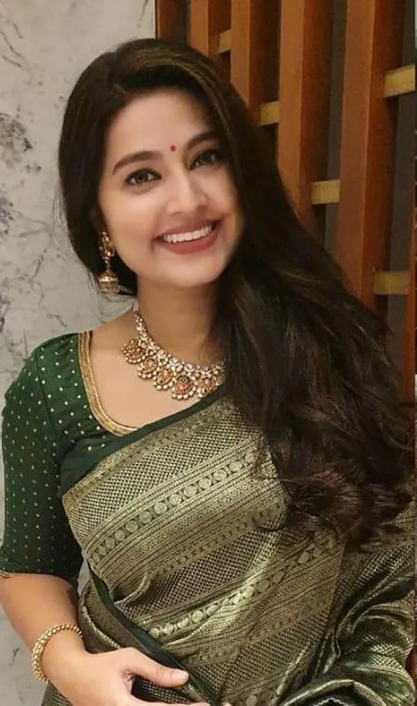 Green_Soft_Silk_Saree_With_Unstitched_Blouse_For_Women