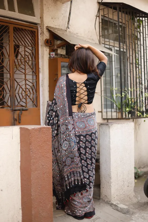TRANDING_BLACK_AJARAKH_BUTTA_LOTUS_MODAL_SILK_MIRROR_WORK_PREMIUM_SAREE_FOR_WOMEN