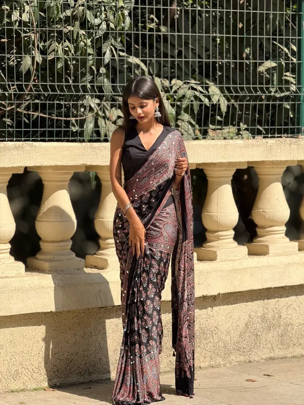 TRANDING_BLACK_AJARAKH_BUTTA_LOTUS_MODAL_SILK_MIRROR_WORK_PREMIUM_SAREE_FOR_WOMEN