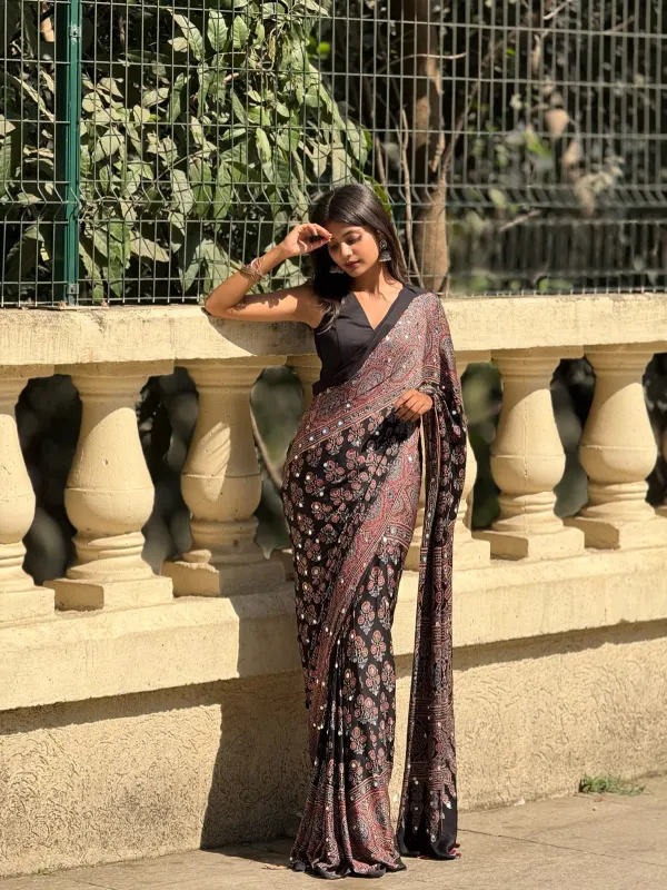 TRANDING_BLACK_AJARAKH_BUTTA_LOTUS_MODAL_SILK_MIRROR_WORK_PREMIUM_SAREE_FOR_WOMEN