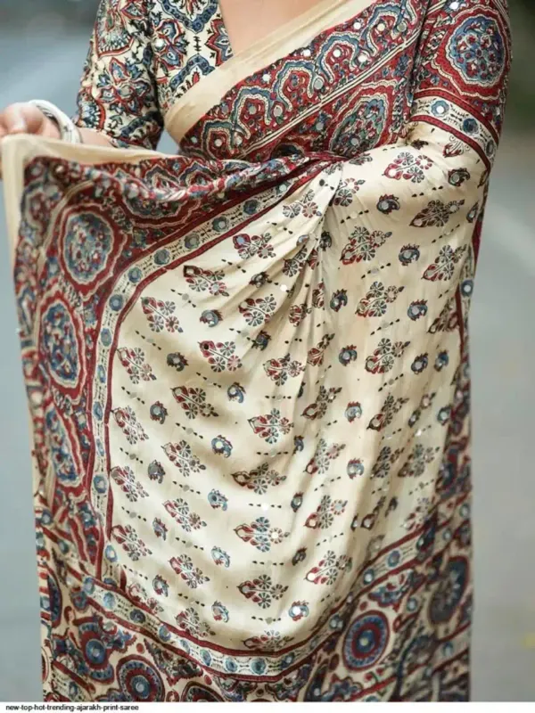 TRANDING_CREAM_AJARAKH_MODAL_SILK_MIRROR_WORK_PREMIUM_SAREE_FOR_WOMEN