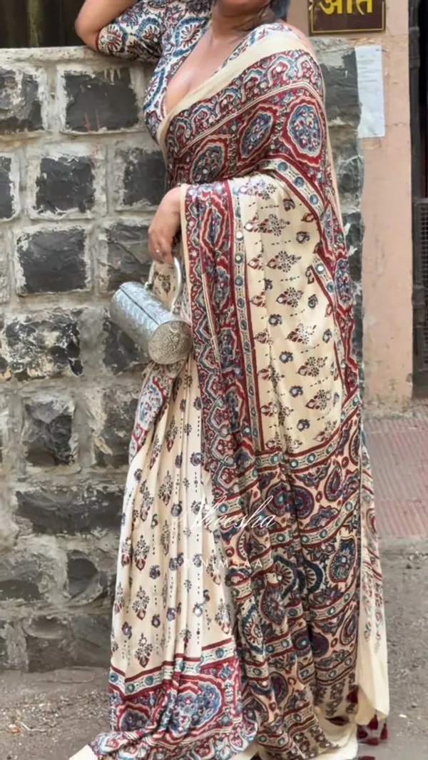 TRANDING_CREAM_AJARAKH_MODAL_SILK_MIRROR_WORK_PREMIUM_SAREE_FOR_WOMEN