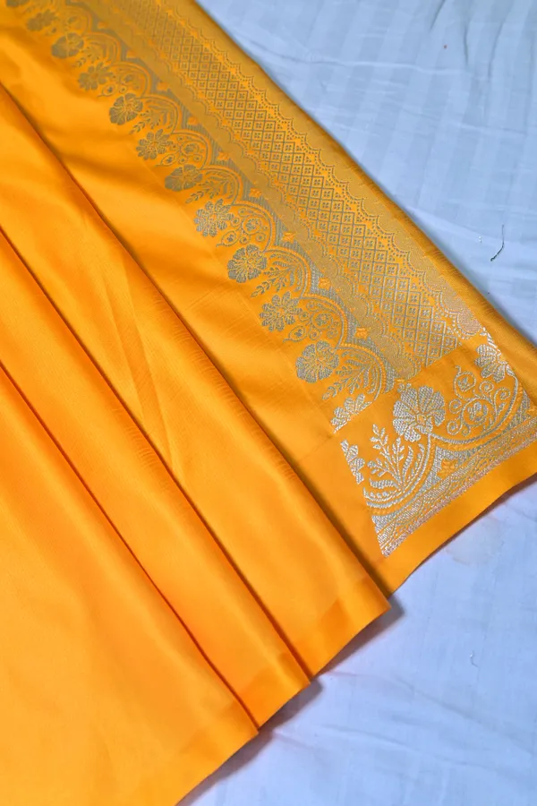 Premium_Yellow_Katan_Banarasi_Silk_Saree_With_Silver_Zari_Floral_Buta_Traditional_Wedding_Festive_Wear