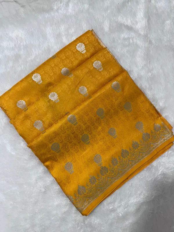 Premium_Yellow_Katan_Banarasi_Silk_Saree_With_Silver_Zari_Floral_Buta_Traditional_Wedding_Festive_Wear