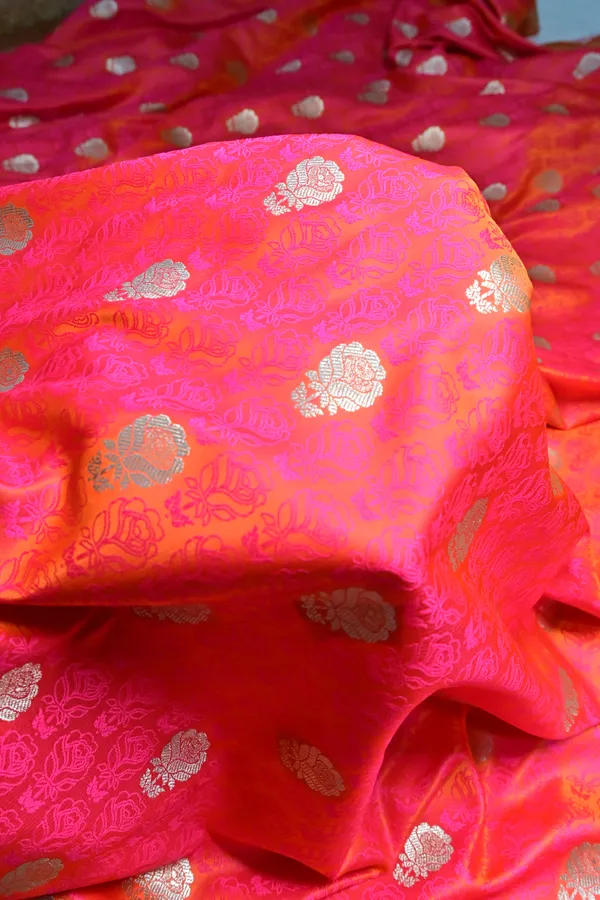 Premium_Strawberry_Katan_Banarasi_Silk_Saree_With_Silver_Zari_Floral_Buta_Traditional_Wedding_Festive_Wear