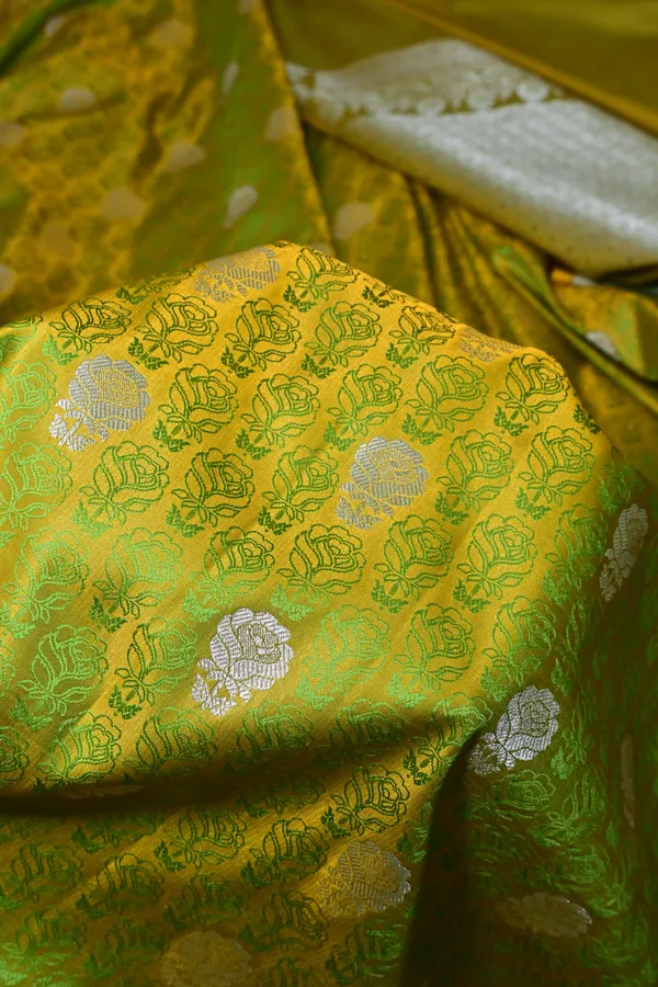 Premium_Lime_Green_Katan_Banarasi_Silk_Saree_With_Silver_Zari_Floral_Buta_Traditional_Wedding_Festive_Wear