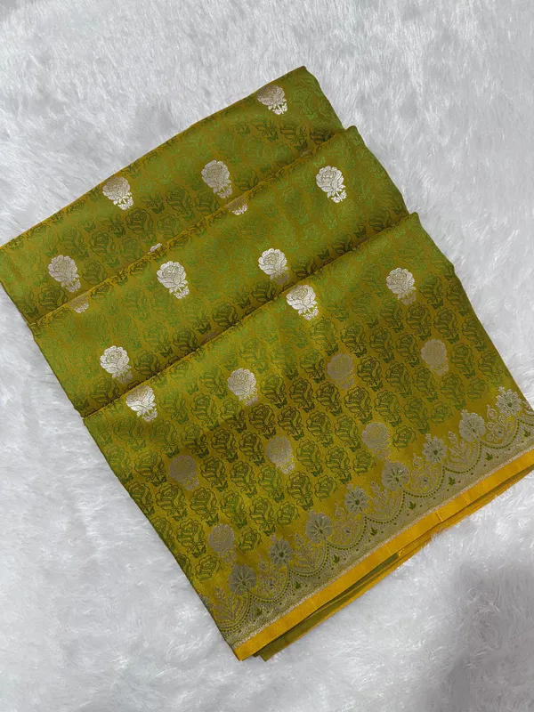 Premium_Lime_Green_Katan_Banarasi_Silk_Saree_With_Silver_Zari_Floral_Buta_Traditional_Wedding_Festive_Wear