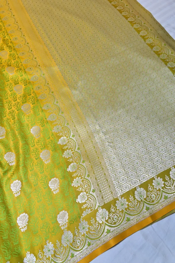 Premium_Lime_Green_Katan_Banarasi_Silk_Saree_With_Silver_Zari_Floral_Buta_Traditional_Wedding_Festive_Wear