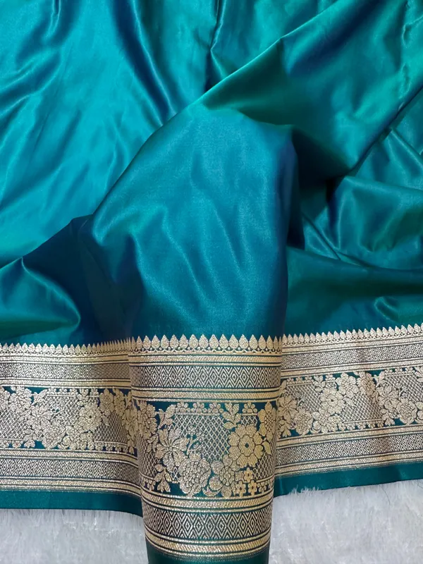 Luxury_Peacock_Blue_Plain_Silk_Saree_With_Rich_Banarasi_Border