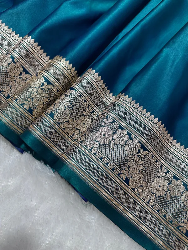 Luxury_Peacock_Blue_Plain_Silk_Saree_With_Rich_Banarasi_Border