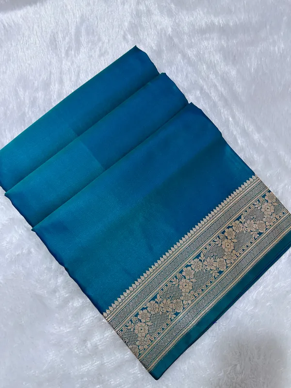 Luxury_Peacock_Blue_Plain_Silk_Saree_With_Rich_Banarasi_Border