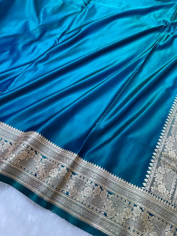 Luxury_Peacock_Blue_Plain_Silk_Saree_With_Rich_Banarasi_Border