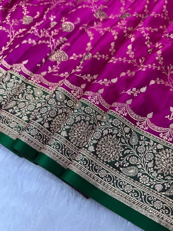 Vibrant_Rani_Pink_And_Deep_Purple_Silk_Banarasi_Saree_With_Multi_Color_Ganga_Jamuna_Border_And_Copper_Zari_Floral_Jaal