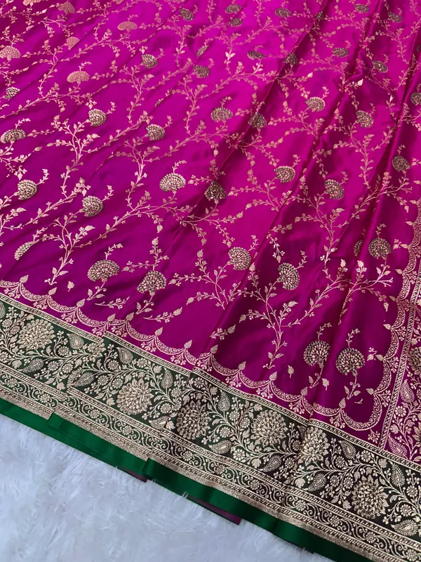 Vibrant_Rani_Pink_And_Deep_Purple_Silk_Banarasi_Saree_With_Multi_Color_Ganga_Jamuna_Border_And_Copper_Zari_Floral_Jaal