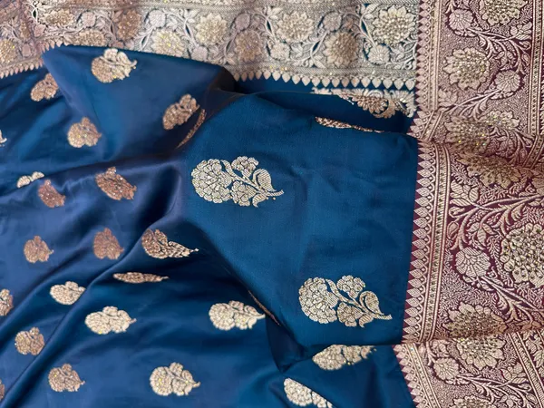 Ink_Blue_Pure_Silk_Banarasi_Saree_With_Majestic_Peacock_Flower_Jhumka_Motif_And_Copper_Zari_Ganga_Jamuna_Border