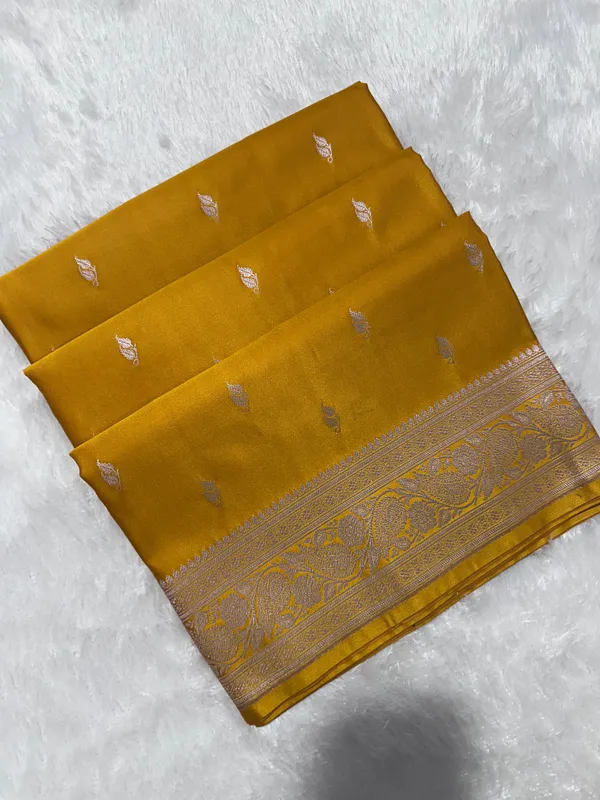 Mustard_Yellow_Katan_Silk_Banarasi_Saree_With_Classic_Copper_Zari_Kalka_Bel_Border_And_Sleek_Leaf_Sprigs