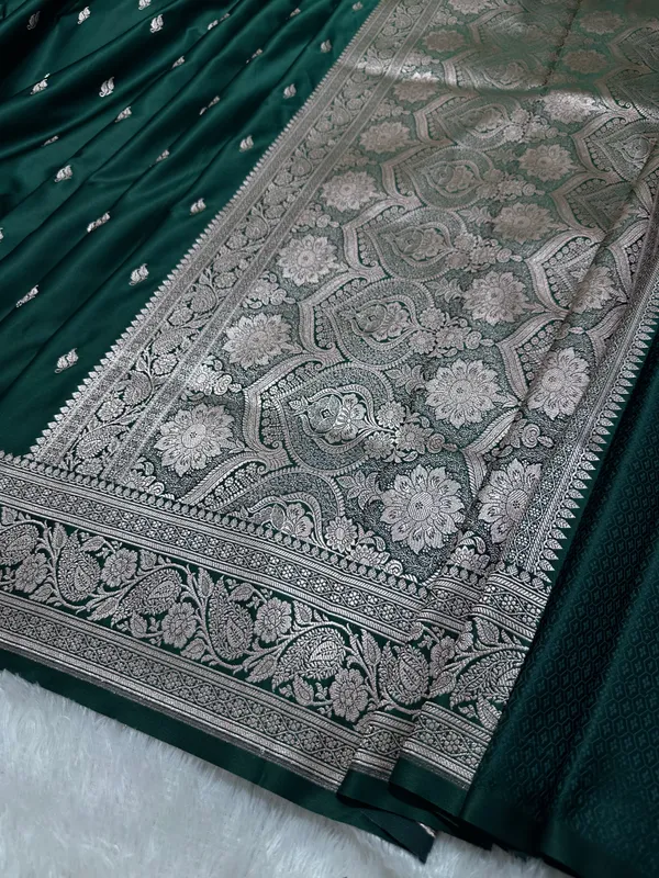 Bottle_Green_Katan_Silk_Banarasi_Saree_With_Heritage_Copper_Zari_Kalka_Bel_Border_And_Sleek_Leaf_Sprigs