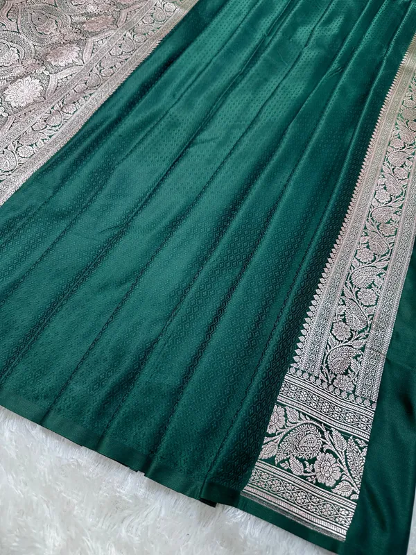 Bottle_Green_Katan_Silk_Banarasi_Saree_With_Heritage_Copper_Zari_Kalka_Bel_Border_And_Sleek_Leaf_Sprigs