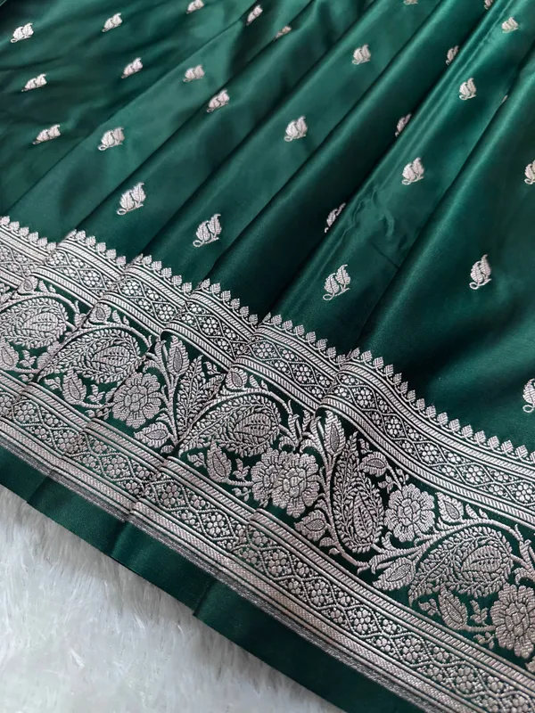 Bottle_Green_Katan_Silk_Banarasi_Saree_With_Heritage_Copper_Zari_Kalka_Bel_Border_And_Sleek_Leaf_Sprigs