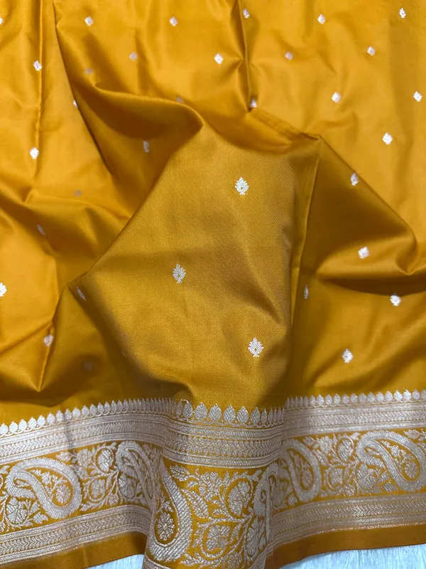 Mustard_Orange_Katan_Silk_Banarasi_Saree_With_Classic_Copper_Zari_Kalka_Bel_Border_And_Sleek_Micro_Butis