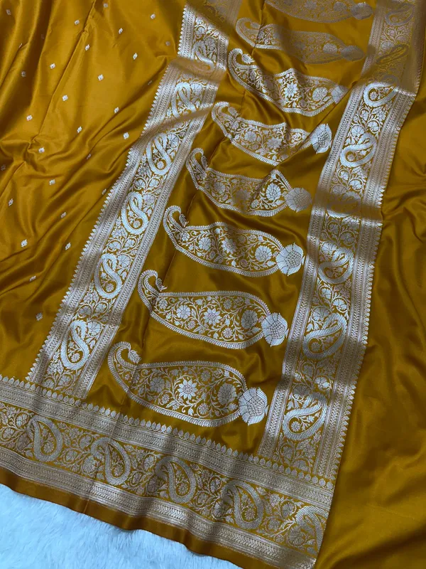 Mustard_Orange_Katan_Silk_Banarasi_Saree_With_Classic_Copper_Zari_Kalka_Bel_Border_And_Sleek_Micro_Butis