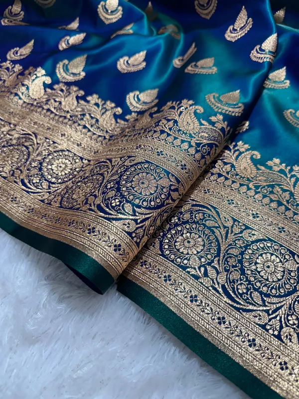 Peacock_Dual_Tone_Satin_Silk_Banarasi_Saree_With_Royal_Guldasta_Chakra_Border_And_Bold_Gold_Panna_Butis