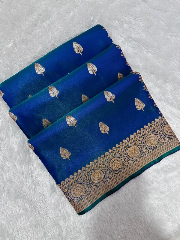 Royal_Peacock_Blue_Satin_Silk_Banarasi_Saree_With_Royal_Guldasta_Chakra_Border_And_Bold_Gold_Panna_Butis