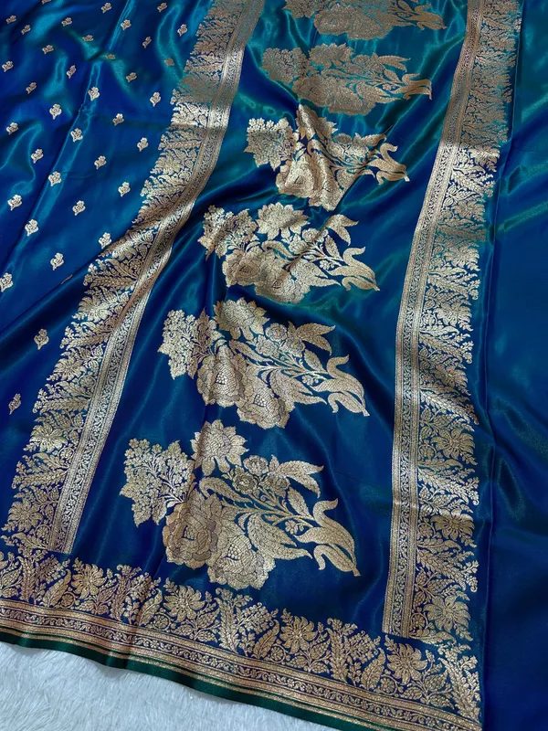 Royal_Peacock_Blue_Satin_Silk_Banarasi_Saree_With_Delicate_Floral_Arch_Border_And_Traditional_Kalka_Butis