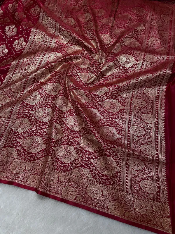 Elegant_Maroon_Satin_Silk_Banarasi_Saree_With_Ornate_Floral_Vine_Border_And_Full_Jaal_Body_Work