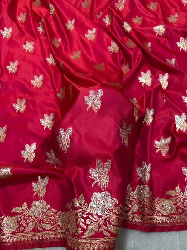 Rani_Pink_Katan_Silk_Banarasi_Saree_With_Royal_Meena_Floral_Border_And_Vertical_Wavy_Floral_Bel_Work