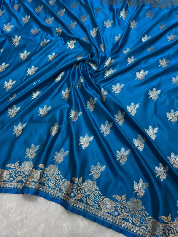 Elegant_Firozi_Blue_Katan_Silk_Banarasi_Saree_With_Delicate_Floral_Arch_Border_And_Traditional_Bouquet_Leaf_Butis