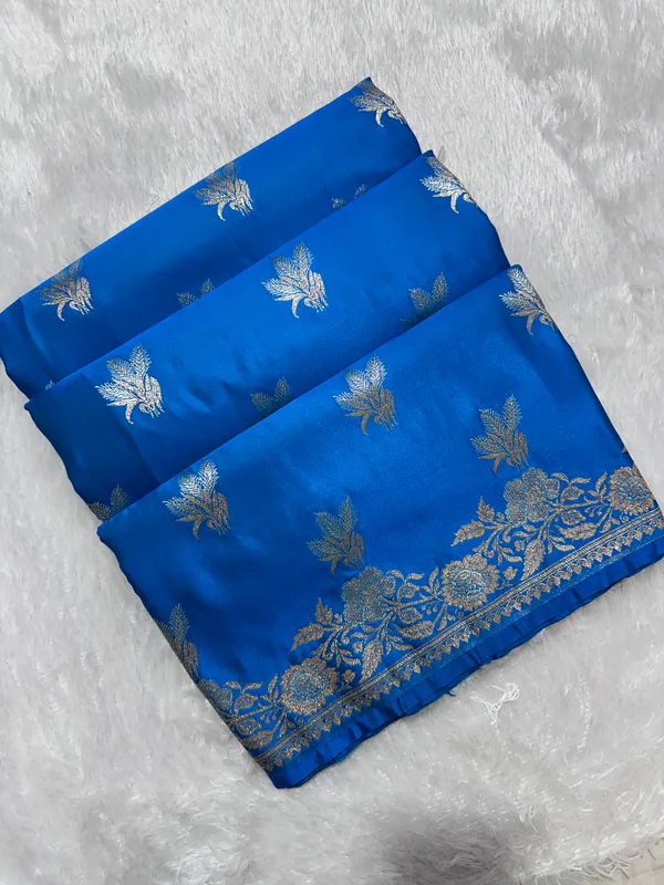 Elegant_Firozi_Blue_Katan_Silk_Banarasi_Saree_With_Delicate_Floral_Arch_Border_And_Traditional_Bouquet_Leaf_Butis