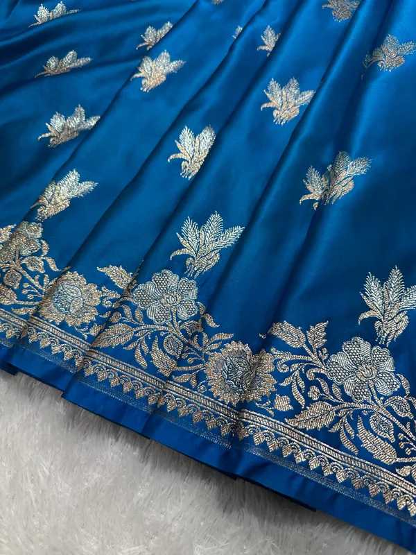 Elegant_Firozi_Blue_Katan_Silk_Banarasi_Saree_With_Delicate_Floral_Arch_Border_And_Traditional_Bouquet_Leaf_Butis