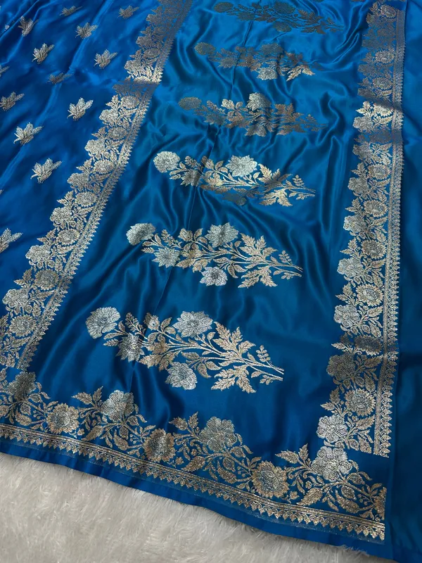 Elegant_Firozi_Blue_Katan_Silk_Banarasi_Saree_With_Delicate_Floral_Arch_Border_And_Traditional_Bouquet_Leaf_Butis