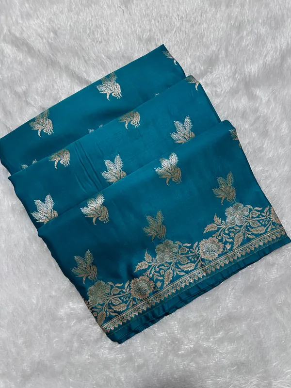 Premium_Peacock_Blue_Katan_Silk_Banarasi_Saree_With_Delicate_Floral_Arch_Border_And_Traditional_Bouquet_Leaf_Butis