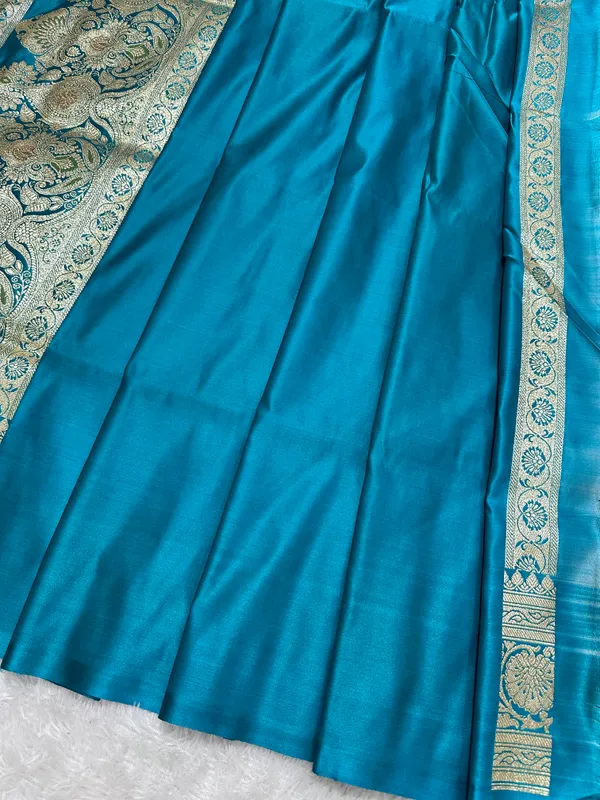 Premium_Peacock_Blue_Katan_Silk_Banarasi_Saree_With_Traditional_Floral_Vine_Jaal_And_Ornate_Zari_Border