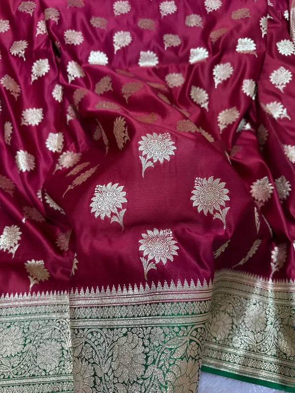 Royal_Wine_Maroon_Katan_Silk_Banarasi_Saree_With_Contrasting_Green_Border_And_Traditional_Sunflower_Butis