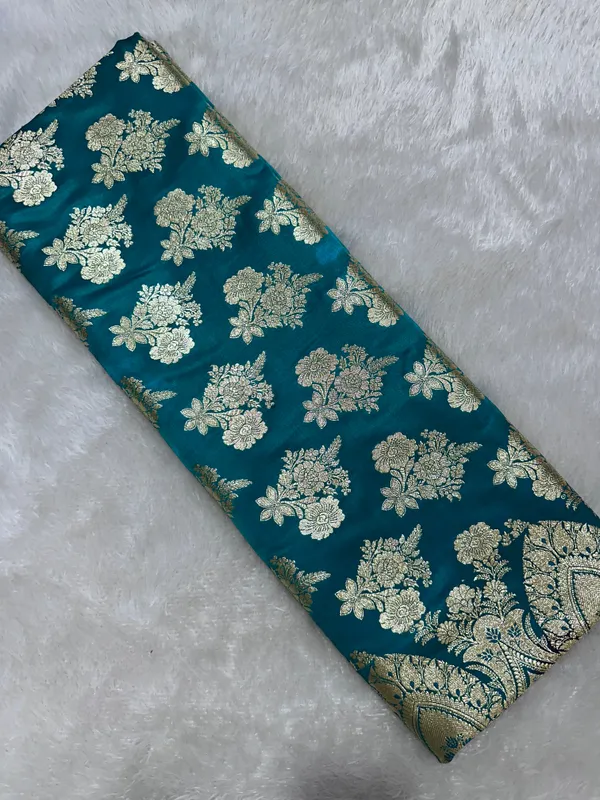 Premium_Peacock_Teal_Green_Katan_Silk_Banarasi_Saree_With_Royal_Heritage_Pallu_And_Traditional_Bouquet_Leaf_Butis