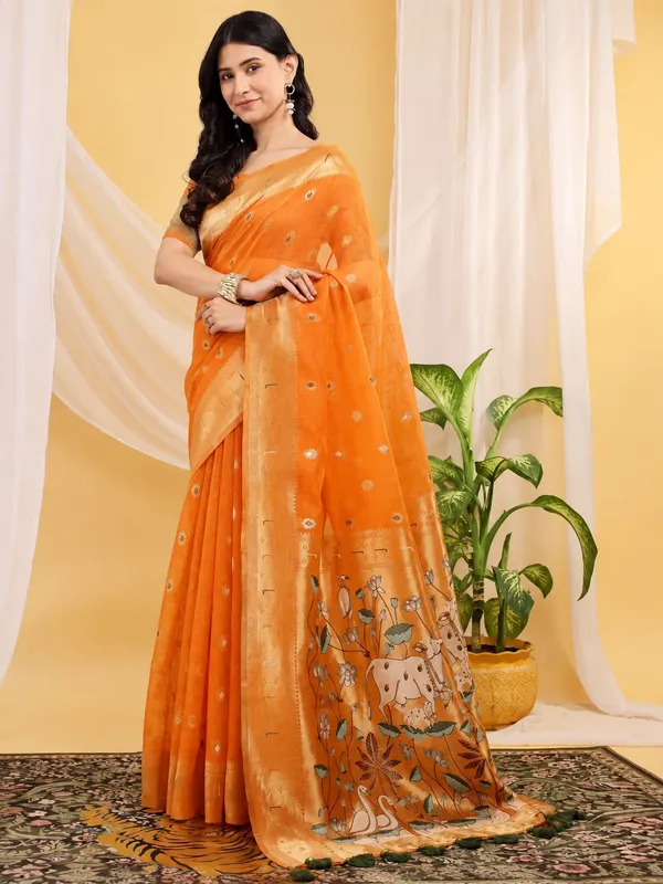 Muga_Cotton_Orange_Printed_Saree_with_Traditional_Floral_&_Cow_Motif_Pallu