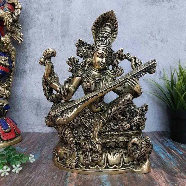 Brass_Traditional_Saraswati_Veena_Peacock_Idol