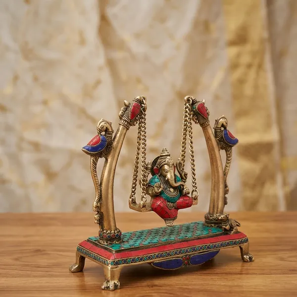 Brass_Lord_Ganesh_On_Peacock_Swing_Jhula_Idol